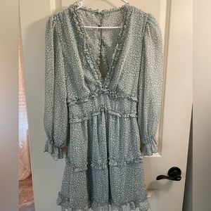 Green mini dress with open back. Size S